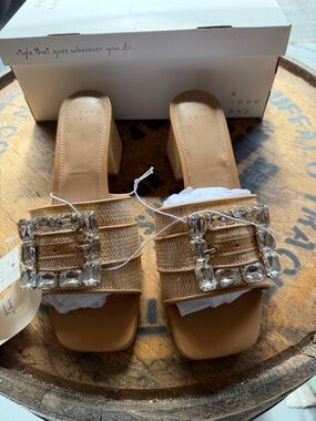 A new Day Tan Raffia Block Heel Mules with Crystal Buckles. Size 8.5/9.